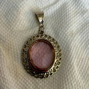 Stunning silver tone pendant with extra large pink bevel cut glass